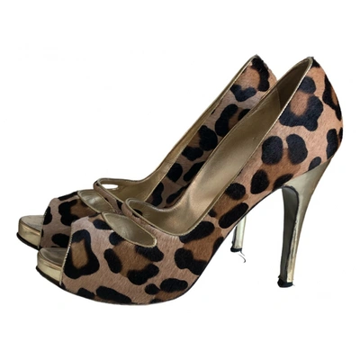 Pre-owned Luciano Padovan Pony-style Calfskin Heels In Gold