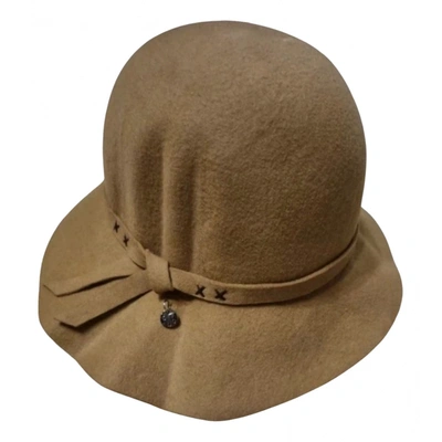 Pre-owned Coccinelle Hat In Camel