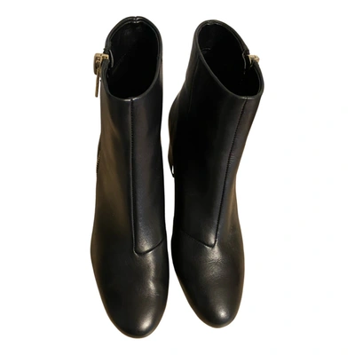 Pre-owned Dkny Leather Ankle Boots In Black