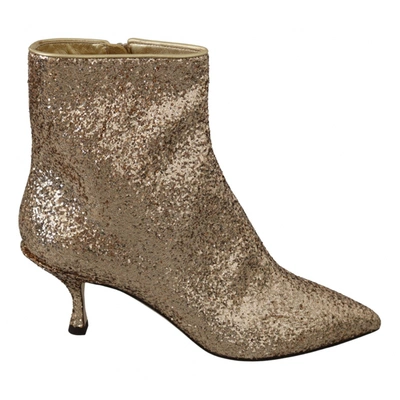 Pre-owned Dolce & Gabbana Leather Ankle Boots In Gold