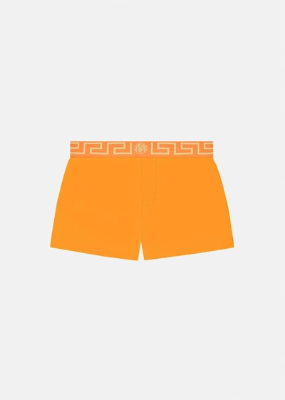 Versace Greca Border Swim Shorts In Orange