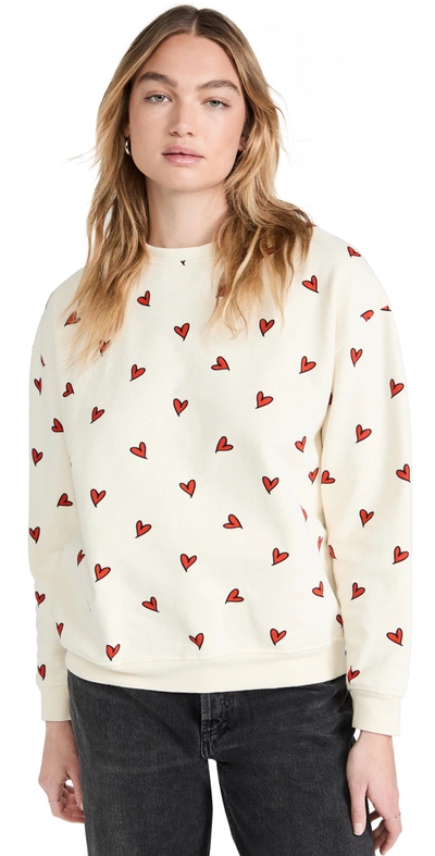 Kule The Oversized All Over Heart Sweatshirt In Ivory