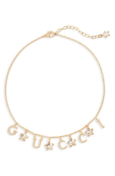 Gucci Script-logo Crystal Star Necklace In Gold,kristall
