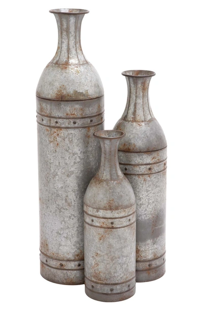Uma Large Cylindrical Hammered Metal Vase In Grey