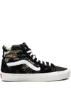 Vans Sk8-hi Sherpa Sneakers In Camo-black In Black