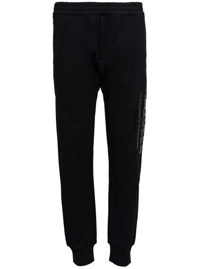 Alexander Mcqueen Graffiti-logo Cotton-jersey Track Pants In Black