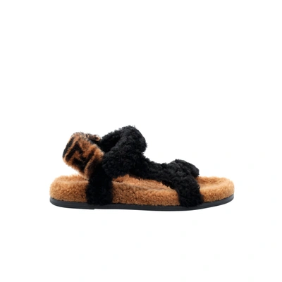 Fendi Feel Logo Detailed Shearling Sandals In Black,brown
