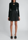 Alaïa Cutout Heart Long Sleeve Top In Noir Alaia