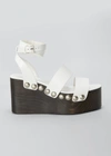 Alaïa 85mm Wooden-heel Wedge Sandals With Shiny Leather Straps And Studs In 020 Blanc Casse