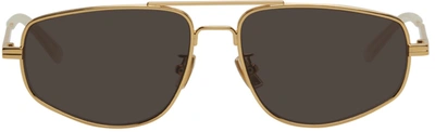 Bottega Veneta Gold Pilot Navigator Minimalist Sunglasses In 002 Gold