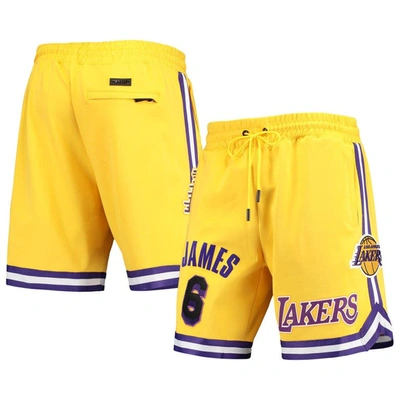 PRO STANDARD PRO STANDARD LEBRON JAMES GOLD LOS ANGELES LAKERS PLAYER REPLICA SHORTS