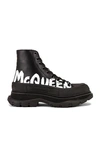 Alexander Mcqueen Tread Slick Logo-embossed Leather Ankle Boots In Black/white