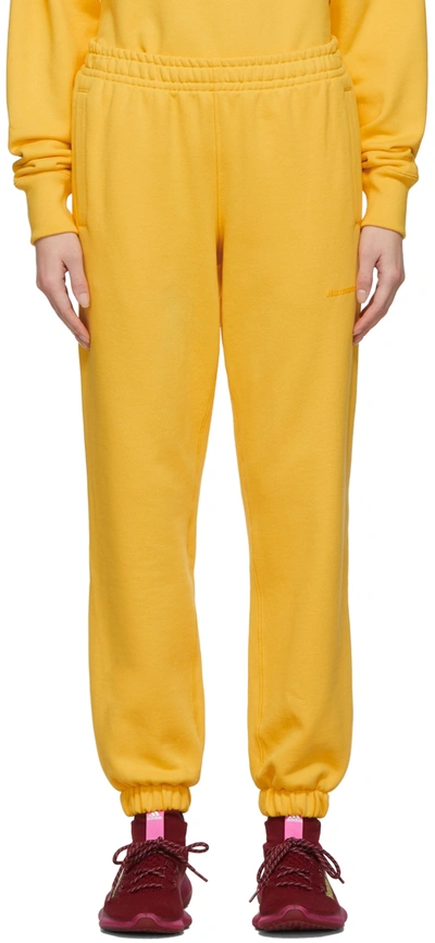 Adidas X Humanrace By Pharrell Williams Ssense Exclusive Yellow Humanrace Basics Lounge Pants In Bold Gold