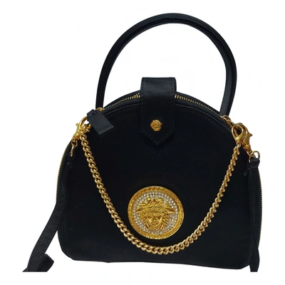 Pre-owned Versace Silk Handbag In Black