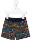 MOSCHINO ALL-OVER LOGO PRINT SHORTS