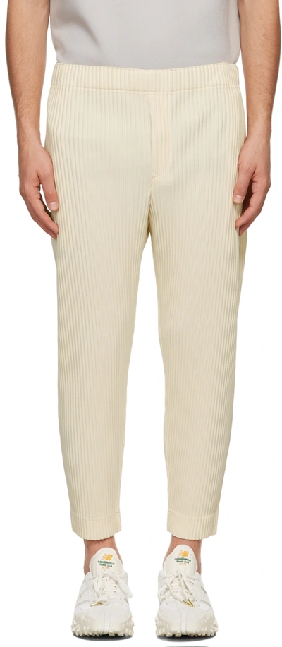 Issey Miyake Pleated Relaxed-fit Tapered Woven Trousers In 04-vanilla Beige