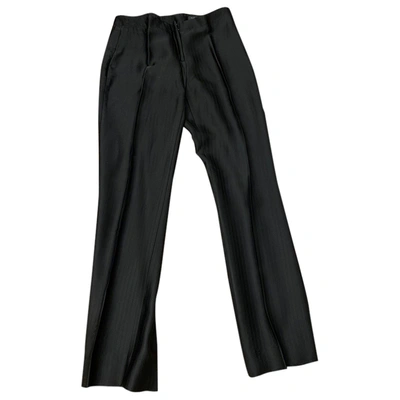 Pre-owned Tombolini Trousers In Black