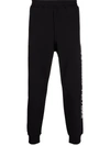 Alexander Mcqueen Slim-fit Cotton Track Pants In Black