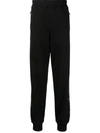 Roberto Cavalli Logo-plaque Tapered Track Pants In Schwarz