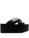 Moschino 80mm Logo-lettering Leather Wedge Slides In Black