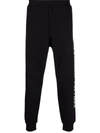 Alexander Mcqueen Slim-fit Cotton Track Pants In Black
