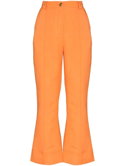 Aje Cantina Flared Trousers In Orange
