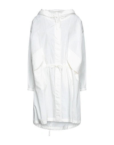 Jil Sander Overcoats In White