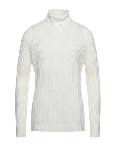 Le Qarant Turtlenecks In Ivory