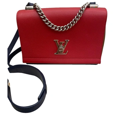 Pre-owned Louis Vuitton Lockme Leather Handbag In Red