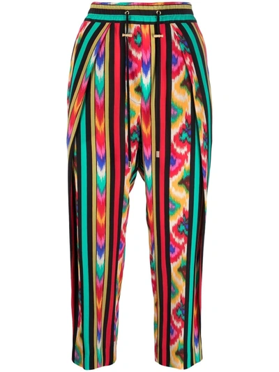Balmain Abstract-print Silk Trousers In Red