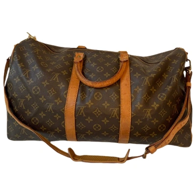 Pre-owned Louis Vuitton Keepall Leather Travel Bag In Brown