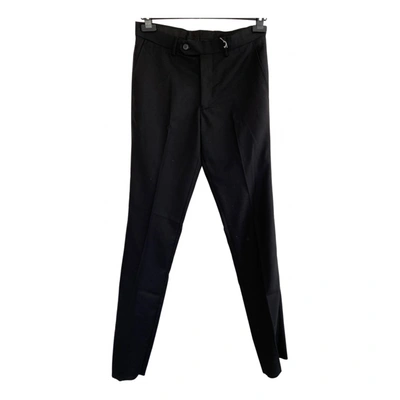 Pre-owned Azzaro Trousers In Black
