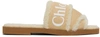 Chloé Woody Shearling-trimmed Logo-print Canvas Slides In 275 Soft Tan