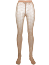 VETEMENTS LOGO-PRINT MESH TIGHTS