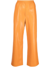 Nanushka Faux-leather Flared Trousers In Orange