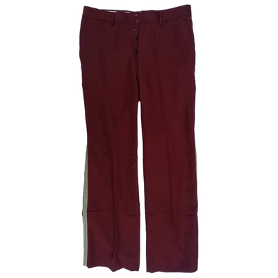 Pre-owned Maison Margiela Wool Trousers In Red