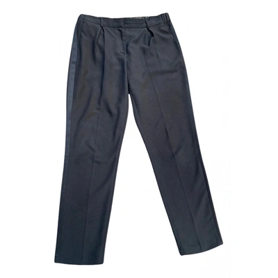 Pre-owned Berenice Trousers In Black