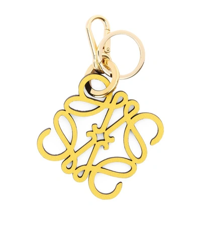 Loewe Anagram Leather And Brass Charm In Yellow