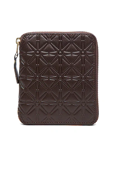 Comme Des Garçons Star Embossed Zip Fold Wallet In Brown