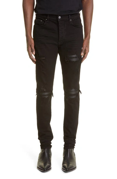 Amiri Mx1 Leather Patch Ripped Skinny Jeans In Aged Black