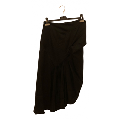 Pre-owned Jw Anderson Wool Mid-length Skirt In Black