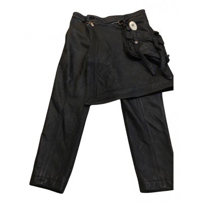 Pre-owned D.gnak By Kang.d Leather Trousers In Black