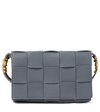 Bottega Veneta Cassette Intrecciato Leather Crossbody Bag In Thunder-gold