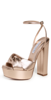 Aquazzura Olie Plateau 140 Knotted Metallic Leather Platform Sandals In Light Copper
