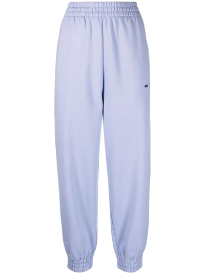 Mcq By Alexander Mcqueen Woman Light Blue Joggers With Logo In Hyper Lilac