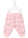 MOSCHINO ALL-OVER LOGO-PRINT TROUSERS
