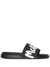Alexander Mcqueen Graffiti Logo Rubber Slide Sandals In Schwarz