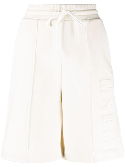 Msgm Embossed Logo Piped-trim Shorts In Nude