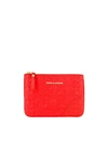 Comme Des Garçons Embossed Leather Zip Wallet In Orange