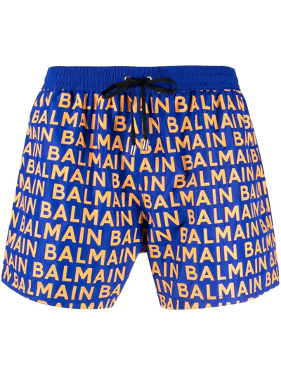 Balmain Monogram-print Slim-fit Swim Shorts In Electric Blue Orange